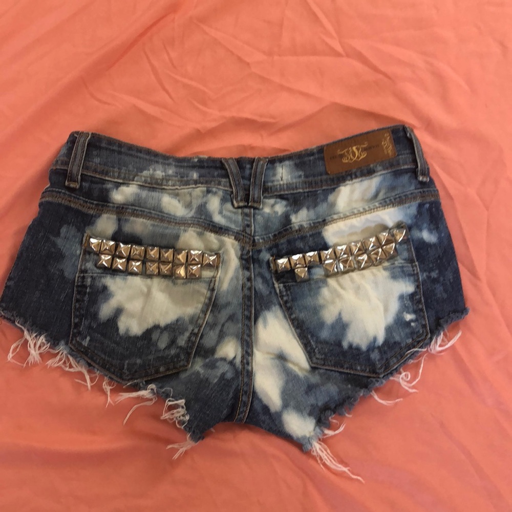 Studded acid wash denim shorts